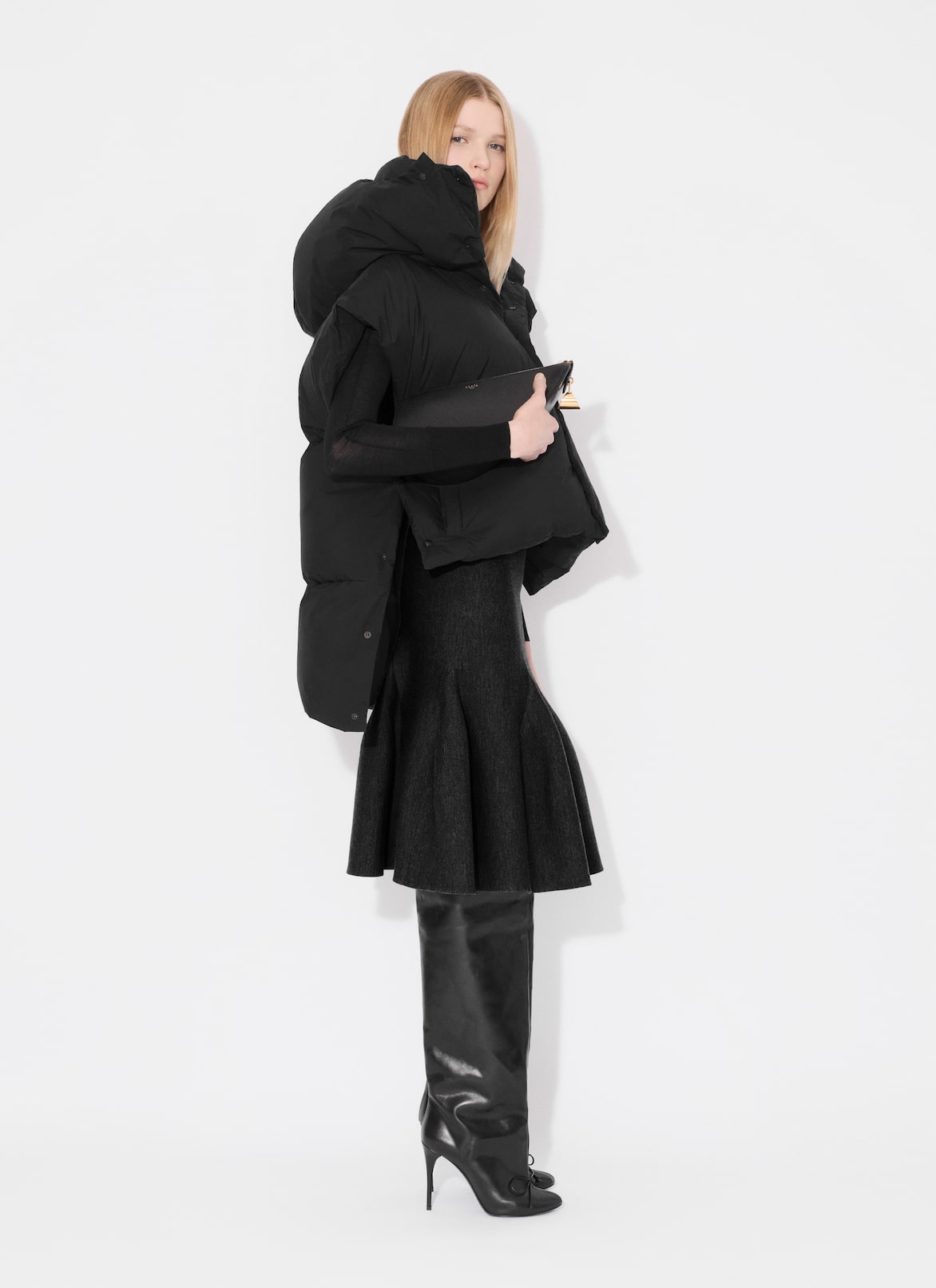 MIDI SKIRT IN SCULPTURAL GODET KNIT ALAÏA BLACK MIDI SKIRT IN SCULPTURAL GODET KNIT